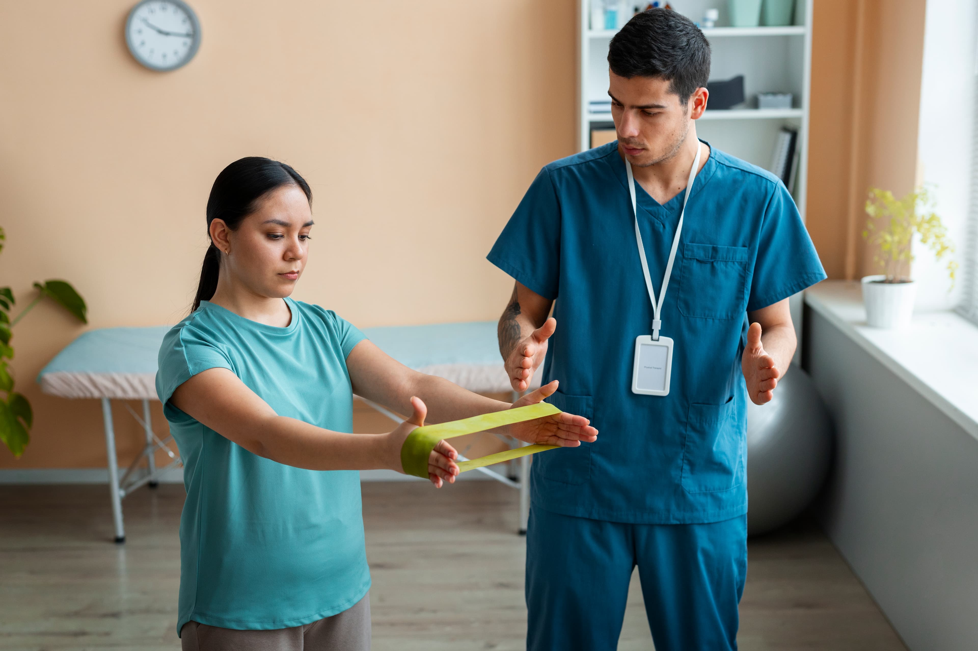 Physical therapist aiding rehab